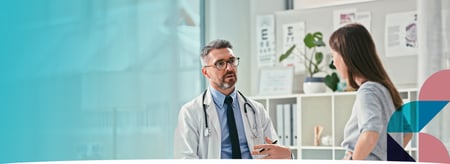 person at the doctor having a discussion